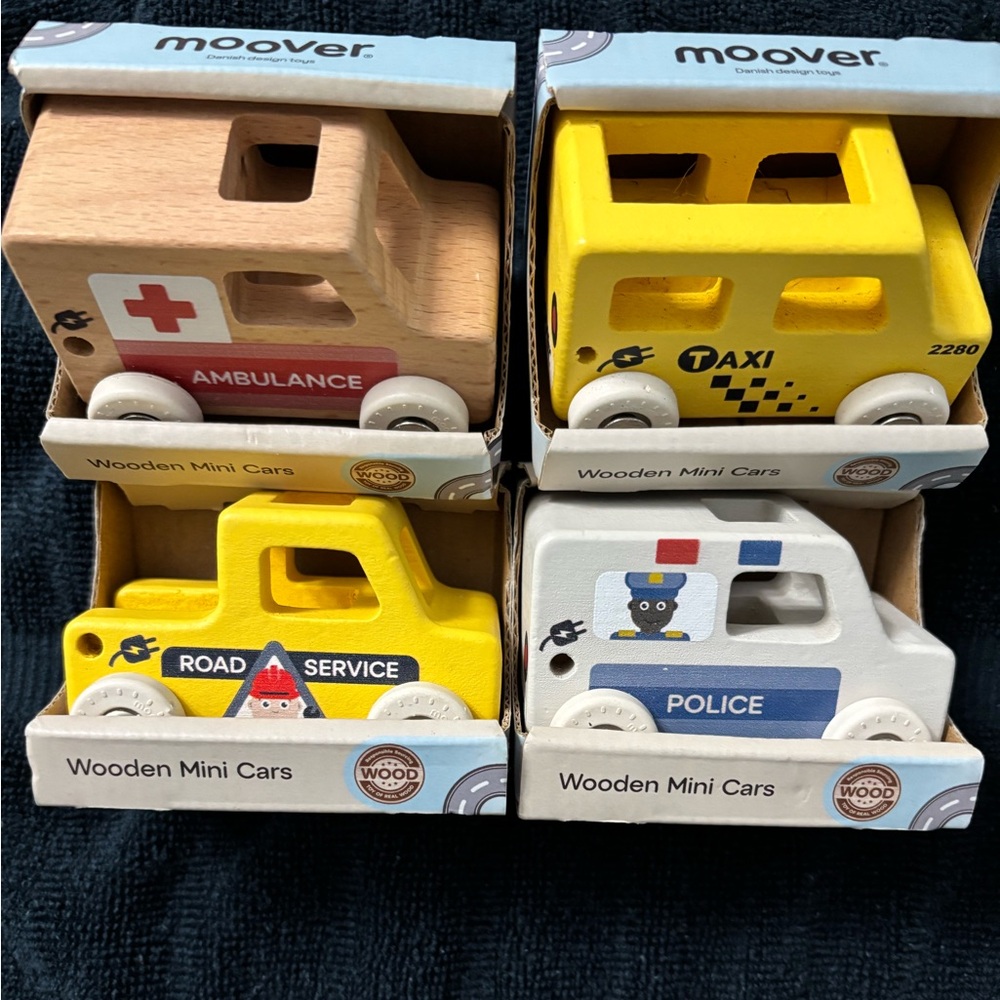 Children’s wooden small cars by moover. There’s 4 of them!